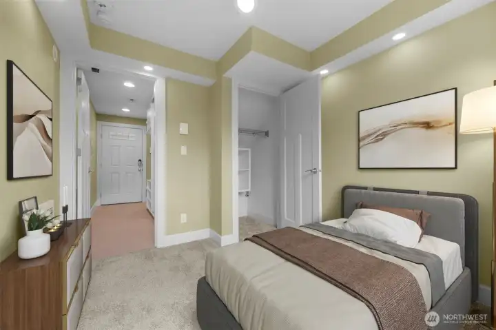 Virtual Staging  A private bottom-level bedroom offers comfort and flexibility, featuring brand new carpet and direct access to a secluded patio for seamless indoor-outdoor living. This versatile space is perfect for guests, a home office, or a quiet retreat, with a thoughtful layout that enhances both privacy and functionality.