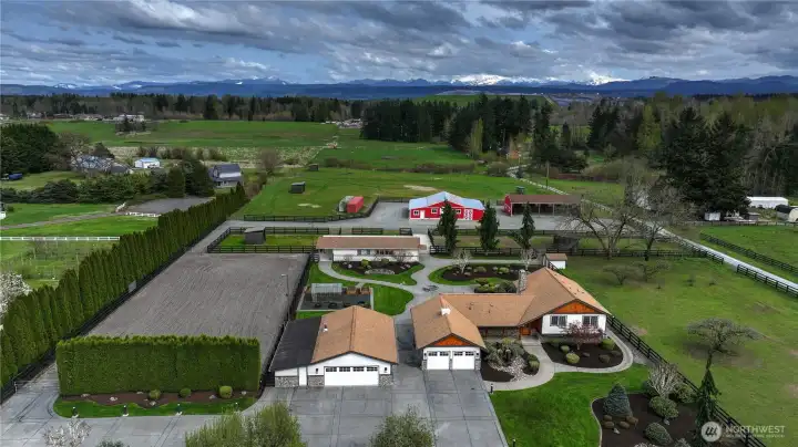 This one checks ALL the boxes!! An exceptional 10-acre equestrian estate with Mt. Rainier views, designed for horse enthusiasts, hobby farmers, or anyone seeking space, beauty, and versatility - the only thing missing is a big red bow!!