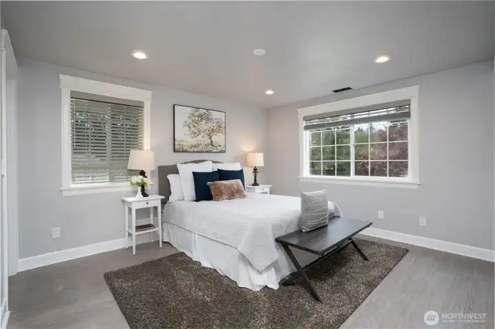 Bedroom one on upper level with an adjacent Jack & Jill Bathroom - looks at the front of property facing west.