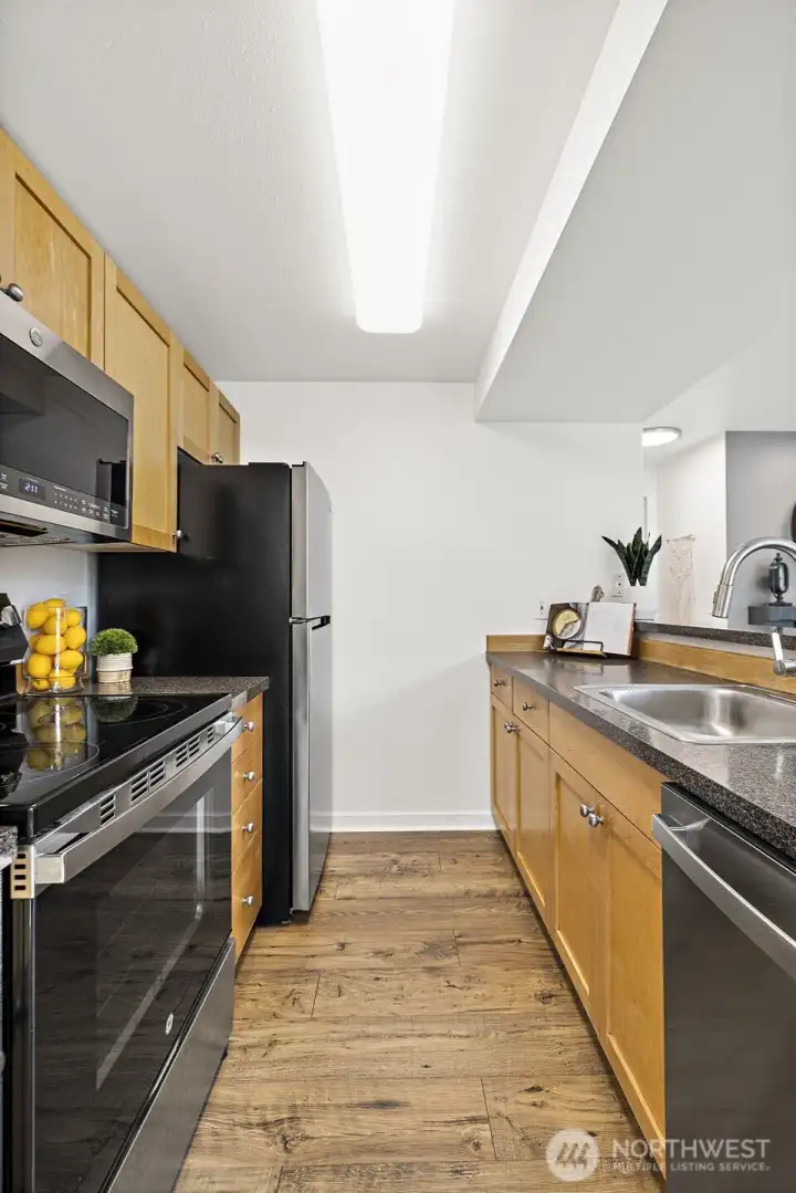 Stainless steel appliances with plenty of storage space.