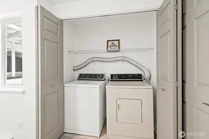 Washer and drying in bedroom closet.