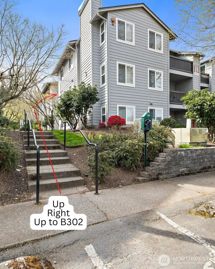 Head up these stairs, then right to head to #B302.