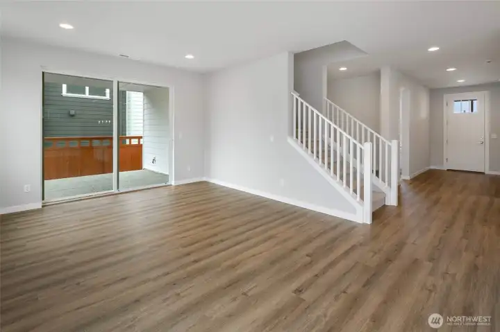 Great Room & Stairwell leading upstairs