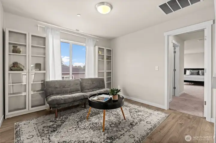 Head upstairs and there is a flex space that could be used as a playroom or sitting room Head upstairs and there is a flex space that could be used as a playroom or sitting room