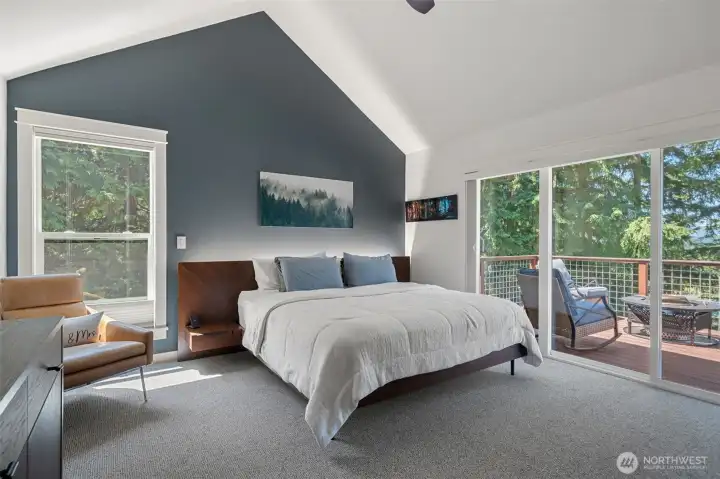 Primary Bedroom. Wake up to water and mountain views.