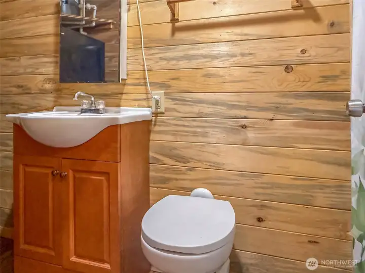 Bathroom with tiled shower in cabin Bathroom with tiled shower in cabin