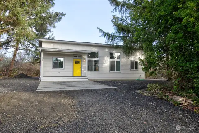 Covered front porch is very inviting.