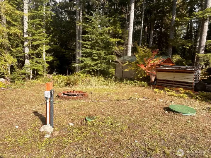 Water and septic are already installed - just bring our imagination and make it your own! 30-amp RV hookup with water and septic clean out. Equipped with 3 water spigots and 2 power hookups, this property is perfectly set up for RV's and camping.