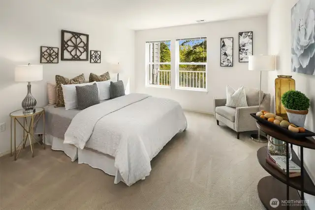 Bright and spacious primary bedroom with wall space for art, bookshelves and additional furniture!