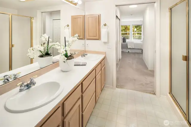Full primary suite with double closets tying the bedroom and bath together!