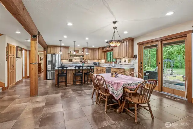 Open concept dining / Kitchen space make it easy to entertain . The covered porch off the kitchen is a great place to hang out too!