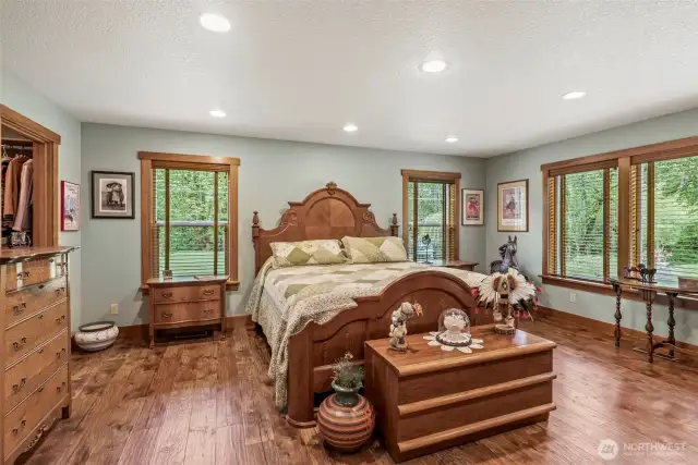 PRIMARY BEDROOM is located on the main floor, with an ensuite bathroom , walk in closet AND another closet too! So much space.. overlooking Germany Creek.. Doesn't get any better than this!