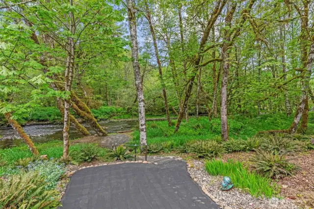 The walkway is PAVED! ( who does that!)  So nice to have this paradise in your own back yard!  You HAVE to see this home in person!