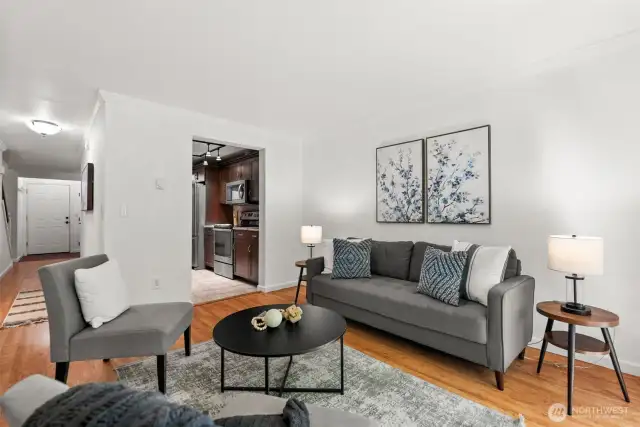 Step into this beautiful living room, bathed in natural light and offering views of the surrounding landscape.