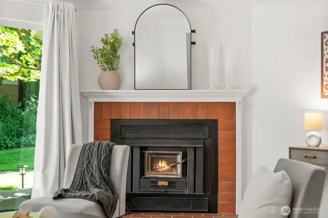 This cozy fireplace insert is the perfect spot to curl up with a warm cup of coffee or tea on chilly evenings.