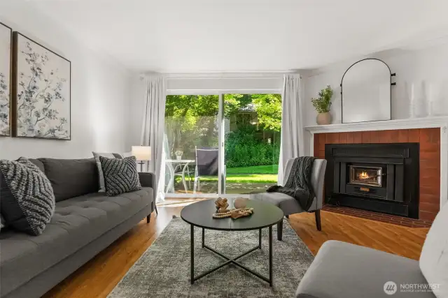 Beautiful hardwood laminate floors add warmth and elegance throughout the home.