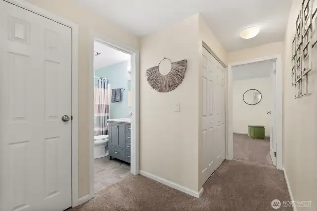 Step upstairs to discover new carpet, adding comfort and freshness to the space.
