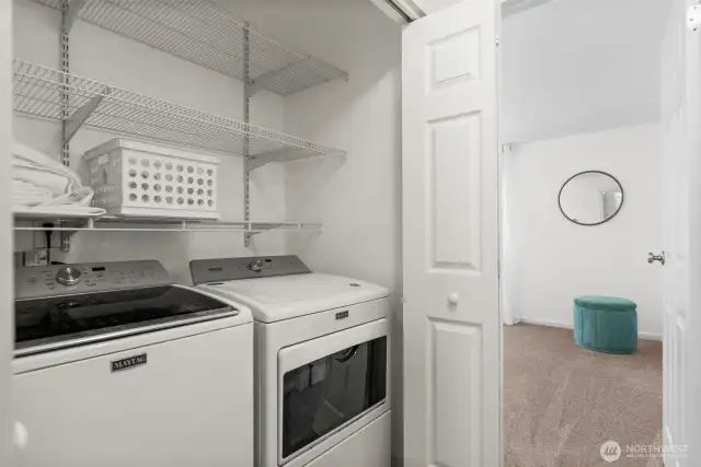 The laundry is conveniently located upstairs, and the washer and dryer are included with the home.