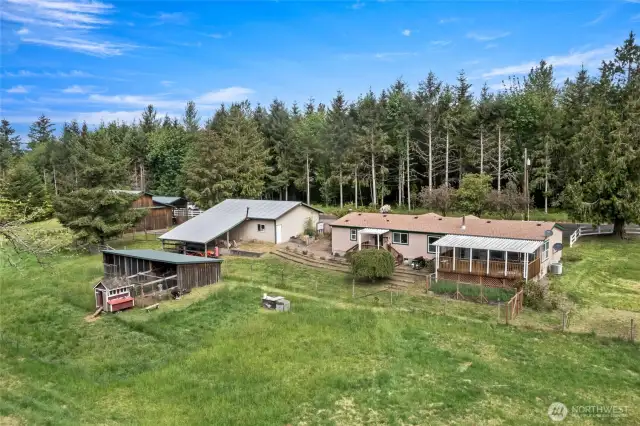 Looking toward the Northwest...Dog run and chicken coop are located just off the shop.