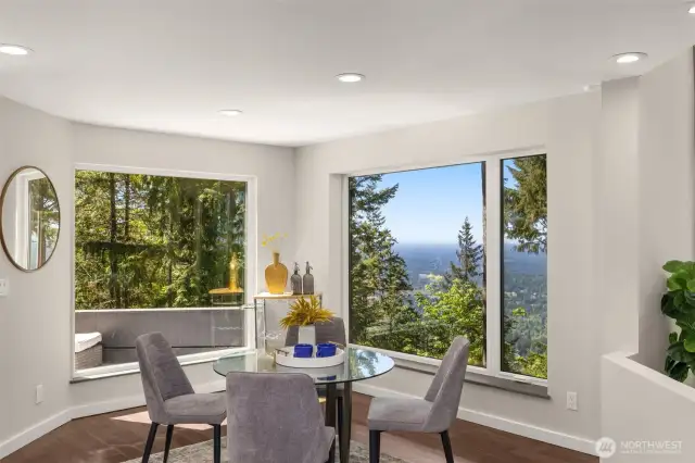 Another dining space sits off of the kitchen and has access to a large deck.