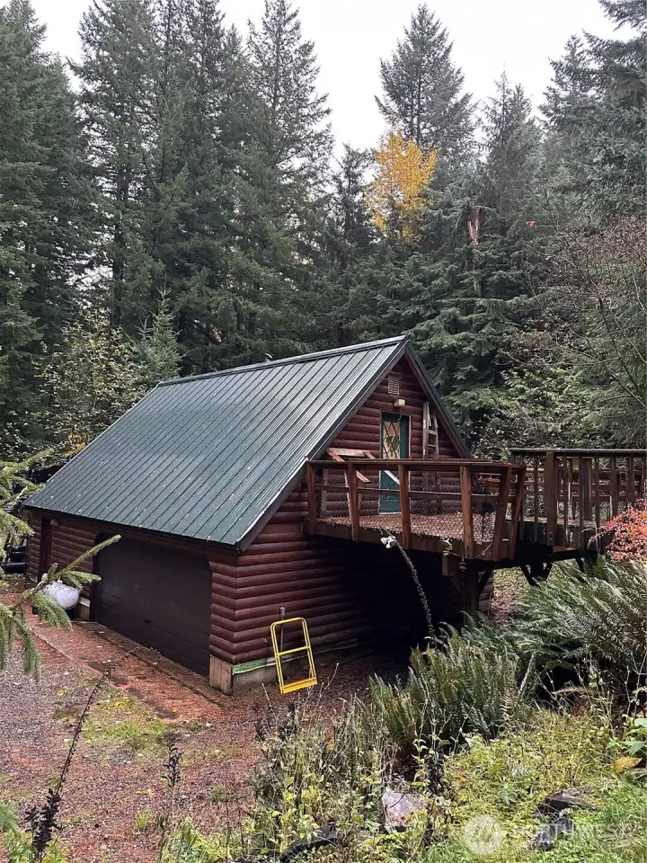 The elevated deck off the back of the house offers the very best summer sunsets.