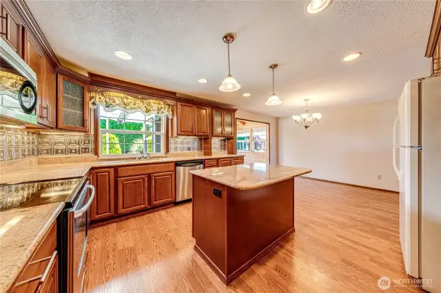 Extremely functional kitchen layout with extra seating space available at island.