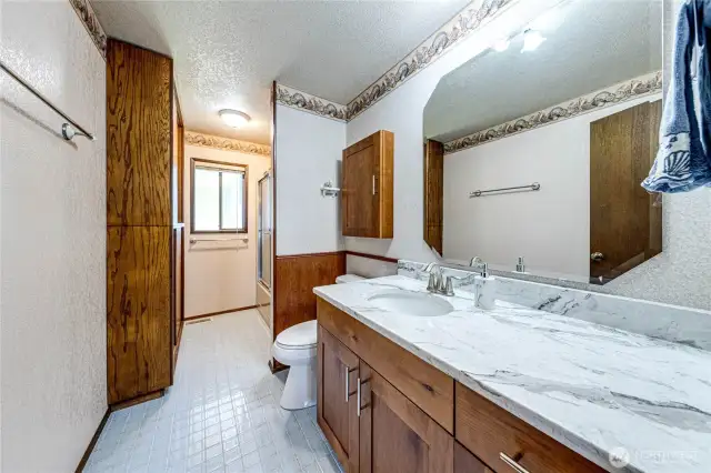 Hall bath with lots of storage.
