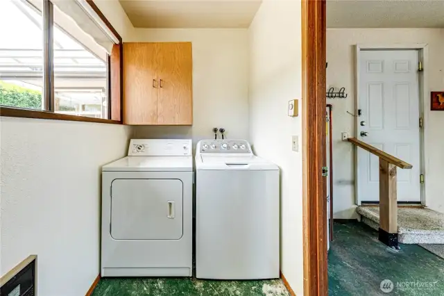 Bright and cheery laundry room.
