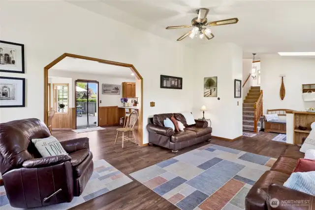 Vaulted Ceilings are topped with a ceiling fan.