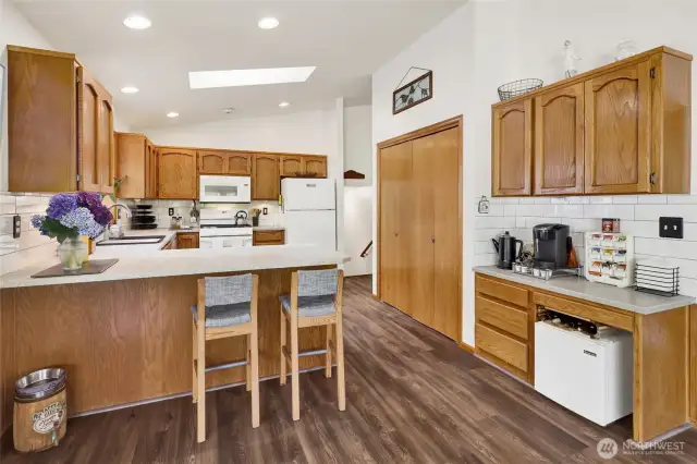 Tons of storage including a double door pantry & a coffee bar!