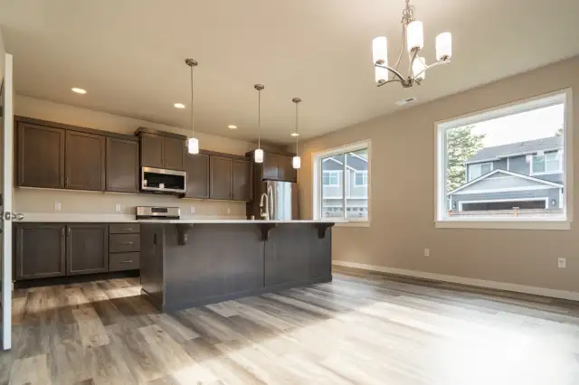 Plenty of space for entertaining with your large island in the kitchen. Makes time in the kitchen enjoyable and plenty of space for bar seating.