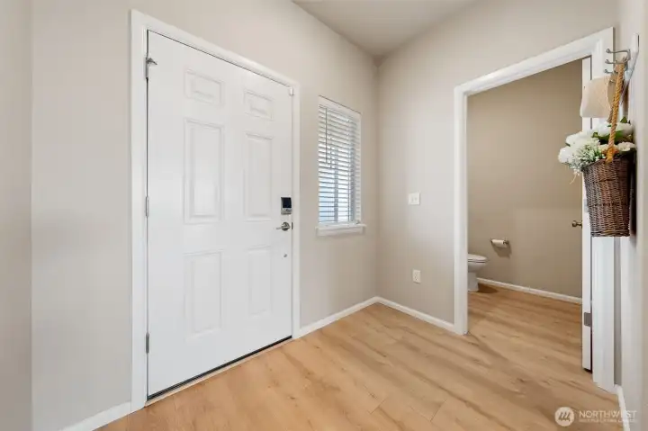 Inside the front entry. A convenient powder room located here.