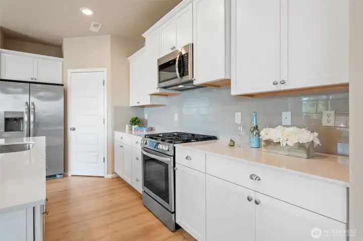 Stainless steel appliaces, a gas range.
