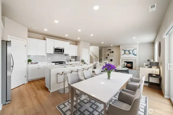Kitchen and dining area with staging.