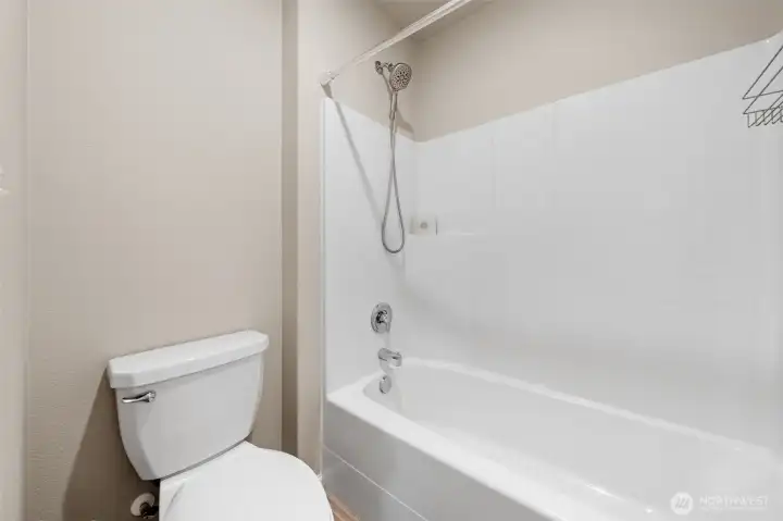Upstairs Hall bath. Separate door to the toilet and shower.