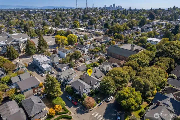 This location is perfect!  Note that Coe Elementary is just around the corner (upper left corner of the photo) and downtown Seattle is in the upper right corner- a 10-15 minute commute from your front door.
