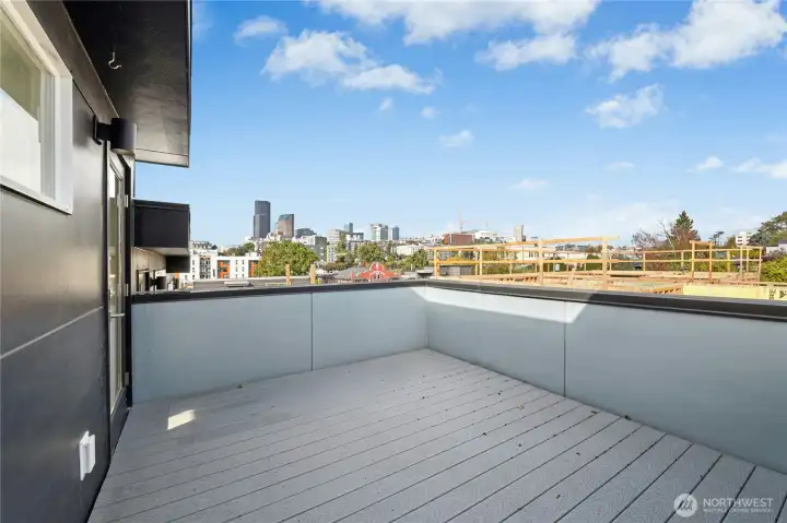 Rooftop deck #1 with views of the Seattle skyline.