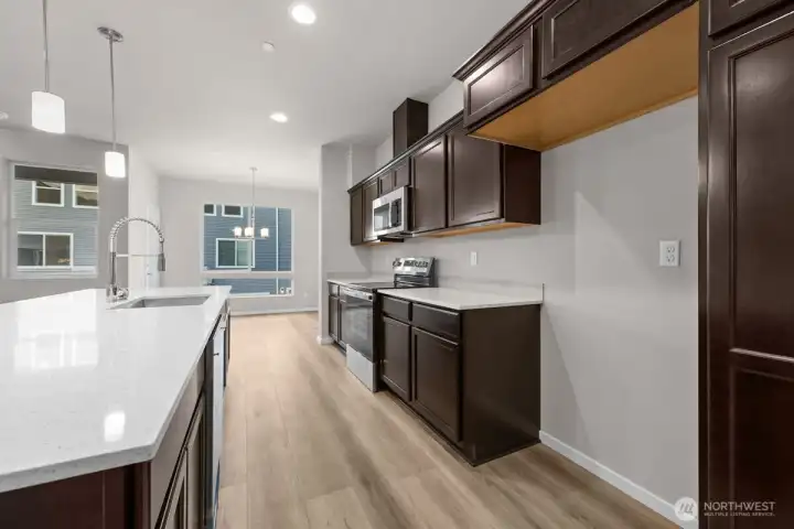 Photographs are for illustrative purposes only. Features, finishes, interior/exterior colors, landscaping and floorplan shown may vary from actual homes built.