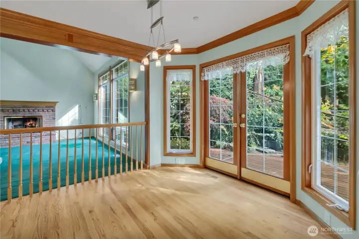 Nook opens to the back yard through french doors.