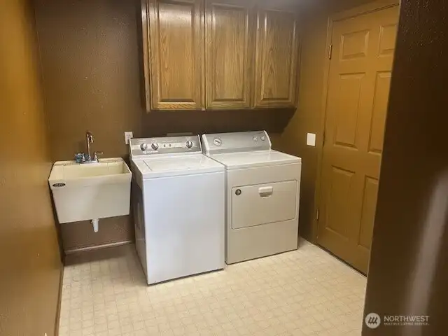 Laundry room off garage for great mud room.