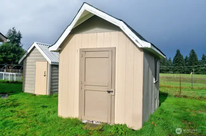 Additional shed and well house.