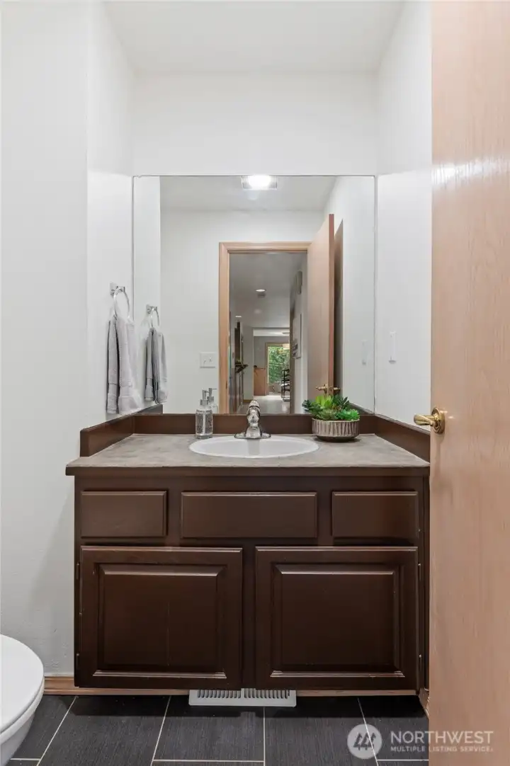 There is also a convenient half-bath on main level.