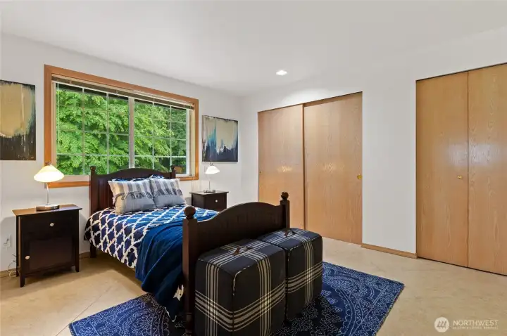 This second upstairs bedroom features dual closets. All rooms are separated from each other for added privacy.