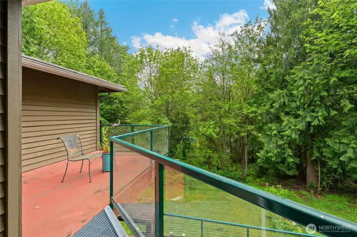 The upstairs private deck is the perfect spot for morning coffee and birdwatching!