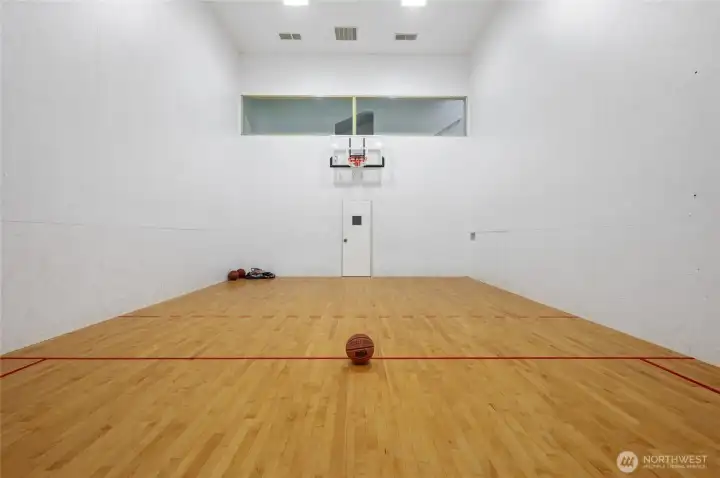 Enjoy the indoor basketball/pickleball court.