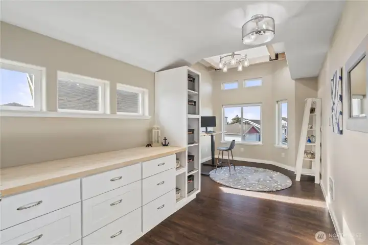 Upstairs office with vaulted ceilings and tons of natural light