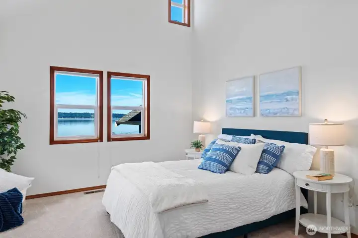 Spacious primary suite with stunning views and private deck