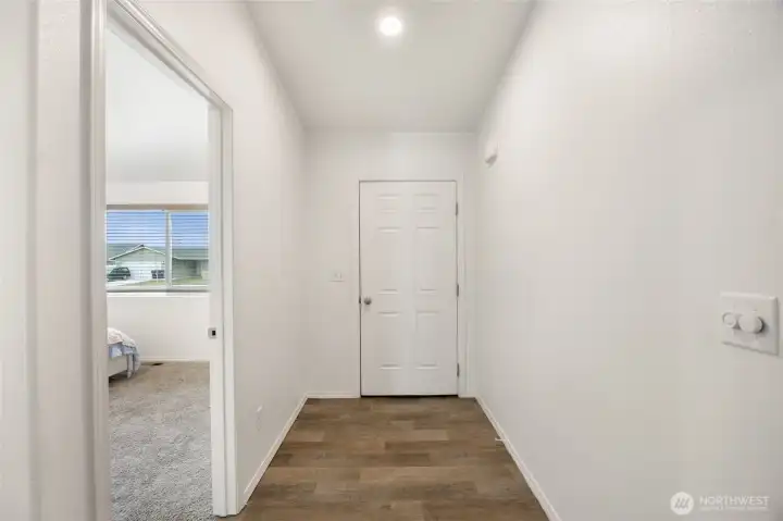 Inside the front door entry.