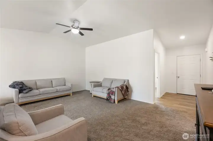 Living Room looking toward the front door.  Bedroom on the left.