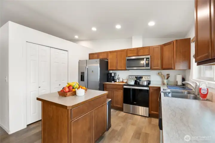 The kitchen has a large pantry behind the double bi-fold doors.